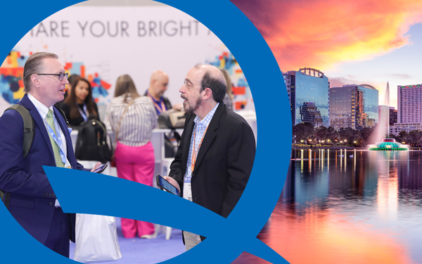 A composite image featuring two contrasting scenes separated by a large, stylized blue graphic resembling the letter 'Q.' On the left, two men are engaged in conversation at ASQ’s World Conference on Quality and Improvement. One man, wearing a blue suit and glasses, holds a smartphone and a white bag, while the other, in a dark suit and light blue checkered shirt, also holds a smartphone. Both wear ID badges, and a crowd is visible in the blurred background. On the right, a vibrant Orlando, Floriday cityscape is shown at sunset, with modern high-rise buildings reflecting a body of water. A fountain with illuminated pink jets and a circular platform are visible in the water, set against a sky of orange, pink, and purple hues. The image conveys a mix of professional engagement and urban elegance.